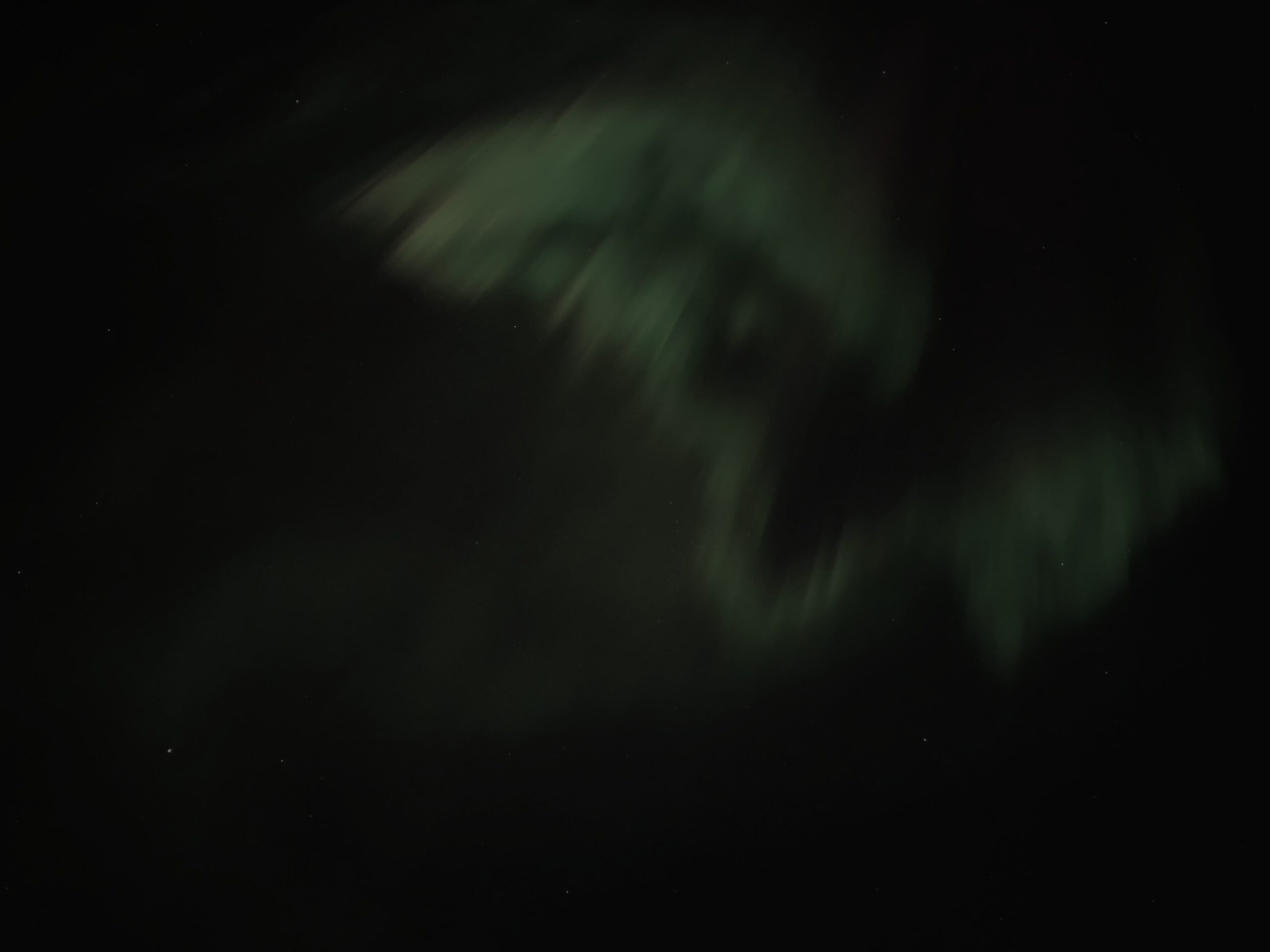 Aurora as you can see with naked eyes, less green and bright but still a bit coloured